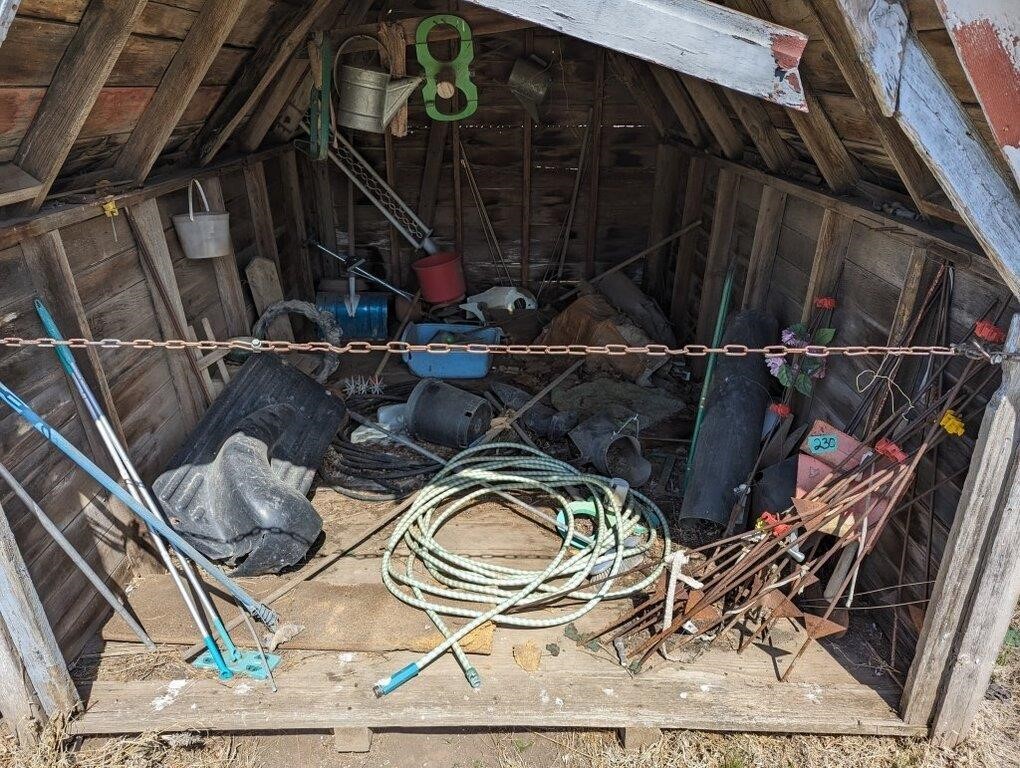Contents of wooden storage shed out back