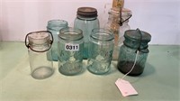 A lot of seven assorted mason jars