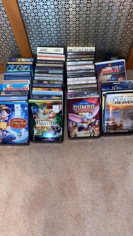 Assortment of DVDs and VHS tapes