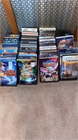 Assortment of DVDs and VHS tapes
