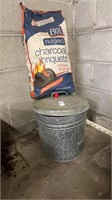 One bag of ridged charcoal briquets and on metal