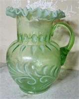 Lovely green glass pitcher approx 9.5 inches tall
