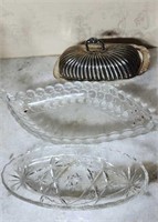 A butter dish and 2 relish dishes