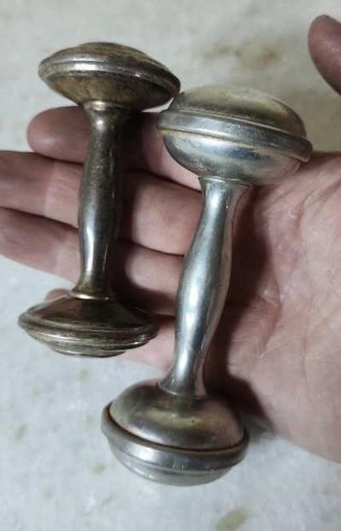 Pair of baby rattles one is pewter