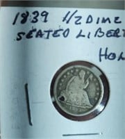 1839 half dime with a hole in it
