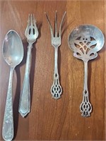 4 sterling silver utensils