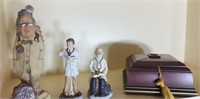 Doctor figurines and a wood storage box