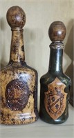 Pair of leather covered Italian bottles