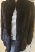 Vintage fur coat appears to be size 12