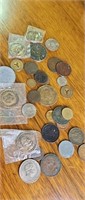 A group of various coins and tokens