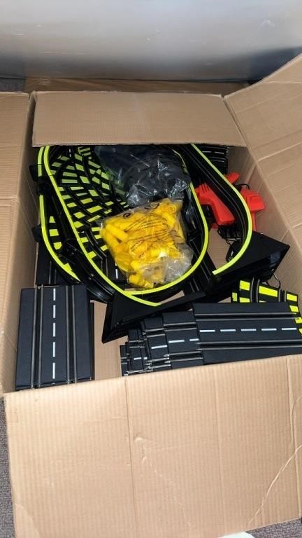 Big box of toy races car parts and track