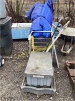 D1. Shopping cart with large tarp with follett