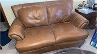 Leather Loveseat 
Approximately 66 inches long,
