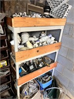 Contents of Shelves full of Plumbing Supplies