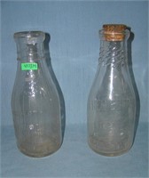 Pair of antique milk bottles includes Bordens and