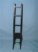Cast iron ladder back chair decorative piece