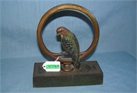 Hand painted cast iron parrot seated in ring door