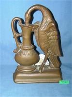 Early bronze bird drinking from urn bookend