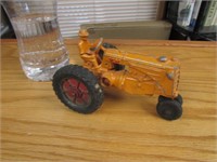smaller minneapolis moline toy tractor w/man