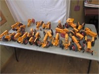 23 minneapolis moline toy tractors,all have damage