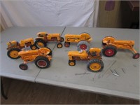 6- minneapolis moline toy tractors,all have damage