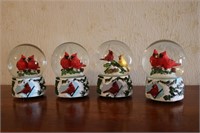 4 cardinal snow globes