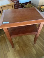 Small solid wood table made by homeowner.