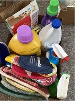 Box lot of cleaning supplies and potholders