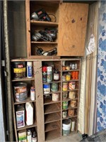 Shelf full of stain and paint
Wall cabinet with