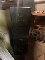Heavy green metal 4 drawer filing cabinet 51”