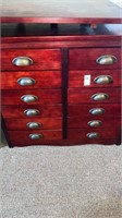 12 drawer wooden cabinet. 29 inches wide by 26
