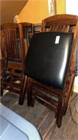 4 wooden fold up chairs