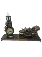 Bronzed desk lamp gas pump and old timey car