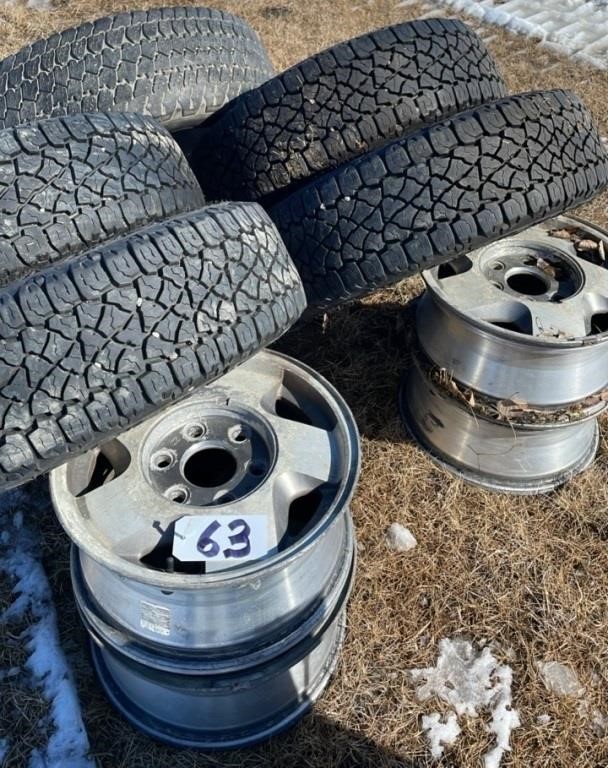 5 Tires with Aluminum Rims. Very good condition.