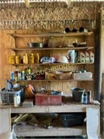 contents of the workbench and the shelves