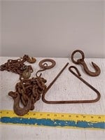Group of pieces of chain and hooks