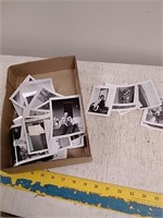 Group of assorted black and white photos