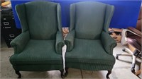 Two vintage wing back chairs