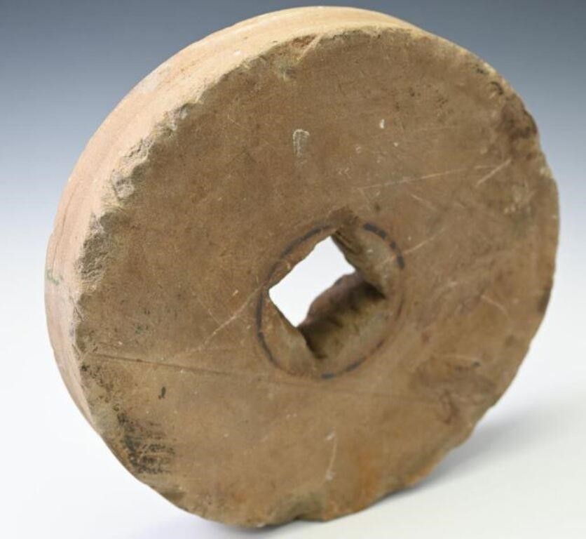Early cylinder grinding stone 11” diameter.