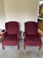 Two Burgundy Reclining Chairs 2’9”x 2’5”x 3’5”