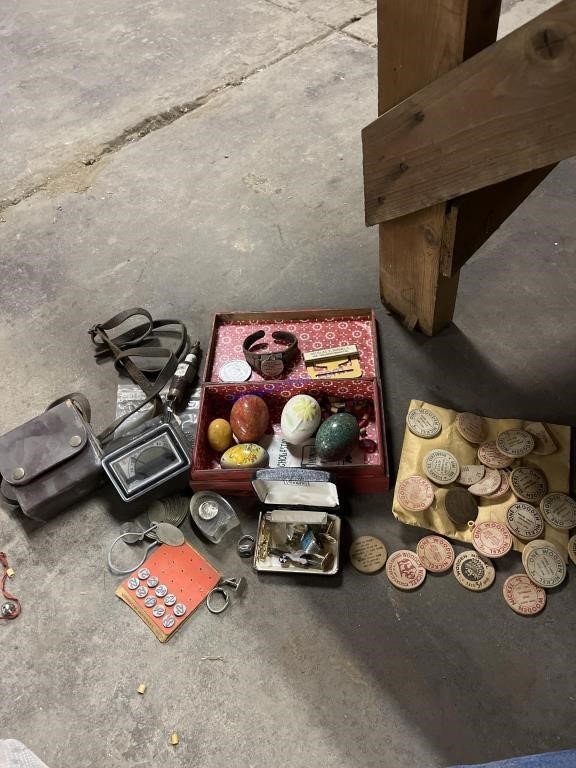 Assorted wooden nickels and antique collectibles