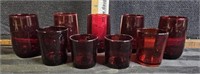 9 small ruby red cups