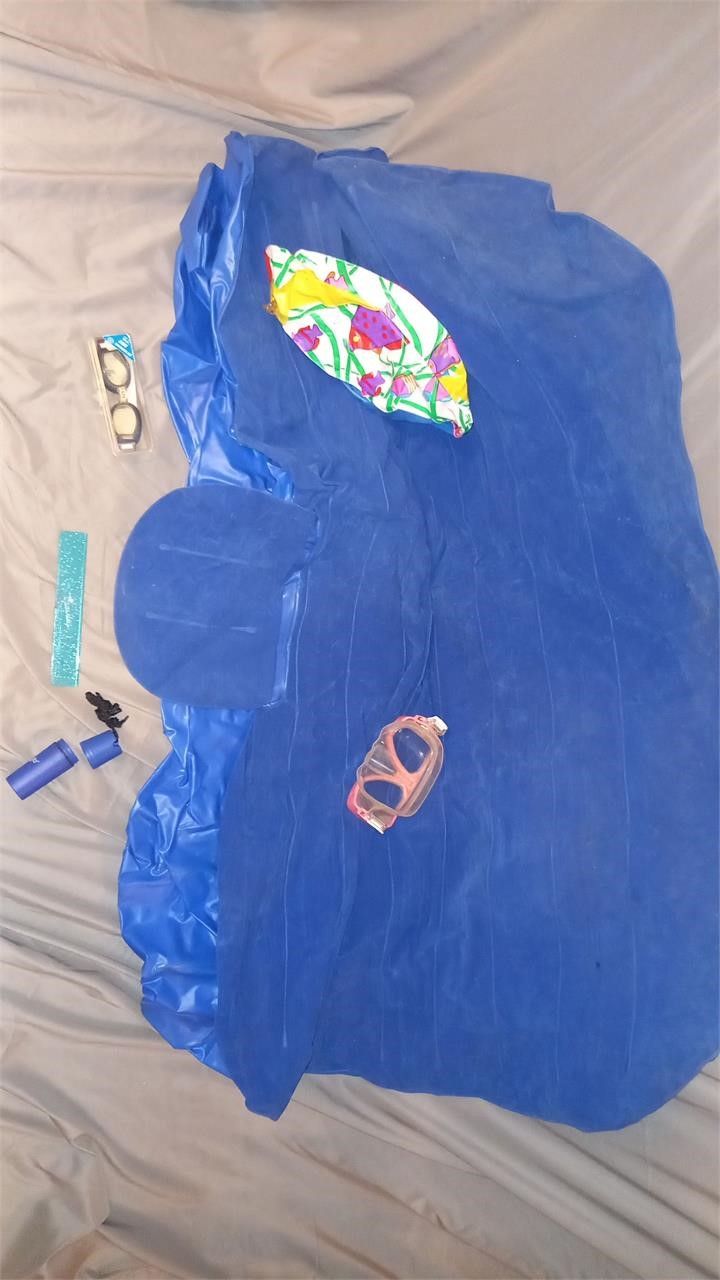 Inflatable mat and beach day items
