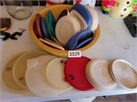 LARGE LOT OF MOSTLY TUPPERWARE LIDS
