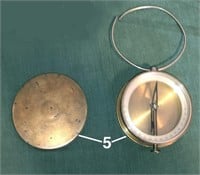 Dip needle compass in brass case
