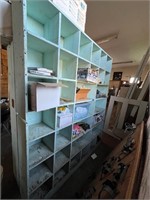 Wooden storage shelves and contents