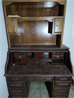 Roll top desk with wooden shelf on top