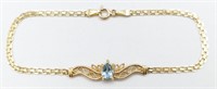 Ladies 14K Yellow Gold Blue Topaz Bracelet