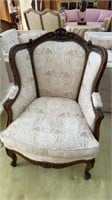 French Louis XV style wingback chair, carved