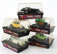 (5) Aurora AFX Magna Traction Slot Cars In Cases
